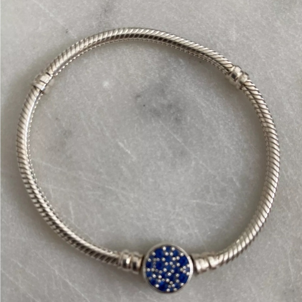 Pandora 6.3 inch bracelet. Used bracelet but it good condition.